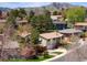 Charming home nestled in a tree-filled neighborhood with mountain views at 12662 W Asbury Pl, Lakewood, CO 80228