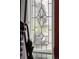 Ornate leaded glass window panel at 12662 W Asbury Pl, Lakewood, CO 80228