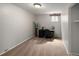 Simple office featuring neutral colored walls, minimal decor, and a small desk at 12662 W Asbury Pl, Lakewood, CO 80228