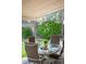 Inviting patio area with an outdoor dining table, perfect for relaxing and entertaining guests in a serene setting at 12662 W Asbury Pl, Lakewood, CO 80228