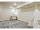 Finished basement with recessed lighting, neutral paint, carpeted floors, and teepee tent at 2945 Grove St, Denver, CO 80211