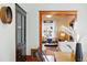 Open-concept dining area flows into a cozy living space, showcasing an elegant china cabinet at 2945 Grove St, Denver, CO 80211