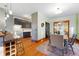 A stylish living area provides an easy transition to the kitchen, making entertaining a breeze at 2945 Grove St, Denver, CO 80211