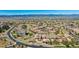 Expansive aerial view of a sprawling suburban neighborhood boasting meticulously landscaped yards and mountain vistas at 835 Stony Mesa Pl, Castle Rock, CO 80108