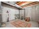 Unfinished basement featuring exposed ceiling, rug and boxes at 835 Stony Mesa Pl, Castle Rock, CO 80108