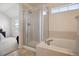 Well-designed bathroom showcasing a glass-enclosed shower and a separate soaking tub at 835 Stony Mesa Pl, Castle Rock, CO 80108
