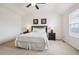 Bright bedroom with natural light, a ceiling fan, and neutral carpeting at 835 Stony Mesa Pl, Castle Rock, CO 80108