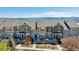 Townhouse exterior with stone accents, and porch at 835 Stony Mesa Pl, Castle Rock, CO 80108