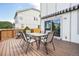 Spacious back deck featuring outdoor seating arrangement and a view of the backyard at 6565 W 99Th Ave, Broomfield, CO 80021