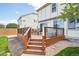 Back deck featuring a dining table and chairs on an outdoor patio at 6565 W 99Th Ave, Broomfield, CO 80021