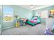 Bright bedroom featuring a spacious layout with a window view and colorful furniture at 6565 W 99Th Ave, Broomfield, CO 80021
