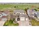 Well-maintained two-story home with a two-car garage, manicured lawn, and lovely landscaping at 6565 W 99Th Ave, Broomfield, CO 80021
