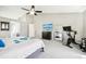 Relaxing main bedroom with a ceiling fan, television, and a comfortable bed at 6565 W 99Th Ave, Broomfield, CO 80021