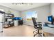 Spacious home office with natural light and ample room for desks, storage, and productivity at 6565 W 99Th Ave, Broomfield, CO 80021