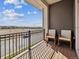 Relax on the balcony with scenic views and comfortable rocking chairs at 2225 S Poppy St, Lakewood, CO 80228