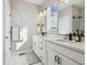 Bright bathroom with double vanity, modern fixtures, and ample counter space at 2225 S Poppy St, Lakewood, CO 80228