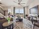 Comfortable living room with a large window, modern decor, and a cozy atmosphere at 2225 S Poppy St, Lakewood, CO 80228