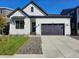 Charming single-Gathering home with a modern farmhouse style, two-car garage, and well-manicured lawn at 5930 S Platte Canyon Dr, Littleton, CO 80123