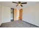 Bedroom with ceiling fan and spacious closet at 1050 N Corona St # 207, Denver, CO 80218