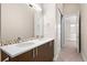 Modern bathroom with dual sinks, mosaic tile accents, and a glass shower at 3735 Kalamath St # 3, Denver, CO 80211