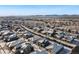 Aerial view of a neighborhood with snow-covered rooftops at 16382 Spanish Peak Way, Broomfield, CO 80023