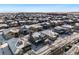 Aerial view of homes in a snow covered neighborhood at 16382 Spanish Peak Way, Broomfield, CO 80023