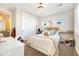 Bright bedroom with a queen-size bed and neutral decor at 16382 Spanish Peak Way, Broomfield, CO 80023