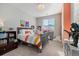 Bedroom with a full-size bed and colorful decor at 16382 Spanish Peak Way, Broomfield, CO 80023