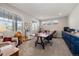 Bright home office features built-in cabinetry and a large work desk at 16382 Spanish Peak Way, Broomfield, CO 80023