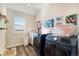 Laundry room with washer, dryer, and extra storage at 16382 Spanish Peak Way, Broomfield, CO 80023