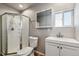 Functional bathroom with a shower, toilet, and modern vanity with mirror at 4900 Beverly Dr, Berthoud, CO 80513