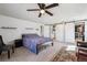 Bright bedroom with a closet, carpet flooring, and shelving at 4900 Beverly Dr, Berthoud, CO 80513