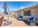 Wooden deck with blue cushioned patio furniture and an umbrella stand at 4900 Beverly Dr, Berthoud, CO 80513