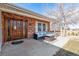 Inviting front porch with outdoor seating and a well-maintained brick facade at 4900 Beverly Dr, Berthoud, CO 80513