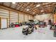 Interior of outbuilding featuring ample storage, vehicle parking, and organizational space at 4900 Beverly Dr, Berthoud, CO 80513