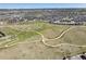 Aerial view of community with open space and park at 3319 Emily St, Castle Rock, CO 80109