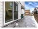 Concrete patio area with sliding glass door access at 3319 Emily St, Castle Rock, CO 80109