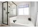 Spa-like bathroom with soaking tub and walk-in shower at 3319 Emily St, Castle Rock, CO 80109