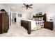 Bright bedroom featuring a king-size bed and ample closet space at 3319 Emily St, Castle Rock, CO 80109