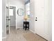 Entryway with tile flooring, a half bath, and a coat closet at 3319 Emily St, Castle Rock, CO 80109