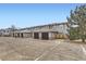 Townhome exterior with private garages and spacious parking at 17224 Lark Water Ln # D, Parker, CO 80134