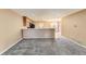 Spacious living room with kitchen access and ample natural light at 17224 Lark Water Ln # D, Parker, CO 80134