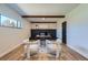 Bright home office with wood floors, modern furniture, and charming decor at 6923 S Albion St, Centennial, CO 80122