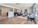 Open-concept living room featuring hardwood floors and plenty of natural light at 6923 S Albion St, Centennial, CO 80122
