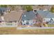Aerial view of home with a deck, neat landscaping, and fenced yard at 1950 Five Iron Dr, Castle Rock, CO 80104