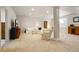Cozy finished basement with neutral carpet, recessed lighting, and comfortable seating at 1950 Five Iron Dr, Castle Rock, CO 80104