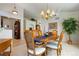 Bright dining room featuring a wood table and built-in shelving at 1950 Five Iron Dr, Castle Rock, CO 80104