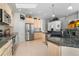 Kitchen boasts granite countertops, stainless steel appliances, and ample cabinet space at 1950 Five Iron Dr, Castle Rock, CO 80104