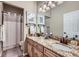 Updated bathroom with double sinks and granite countertops at 4993 Sedona Cir, Parker, CO 80134