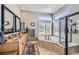 Elegant bathroom with a corner soaking tub and double vanity at 4993 Sedona Cir, Parker, CO 80134